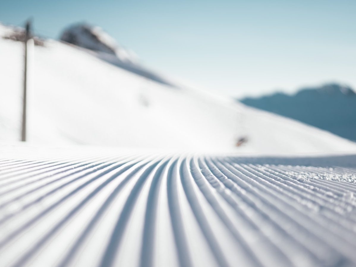 snow covered field during day